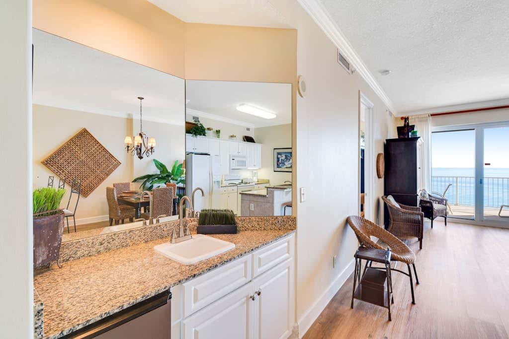 Gulf-front condo with balcony, central AC, pools, hot tubs & beach access