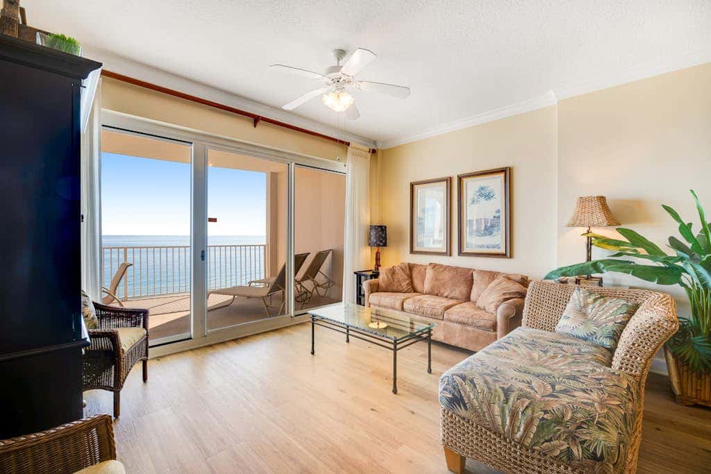 Gulf-front condo with balcony, central AC, pools, hot tubs & beach access
