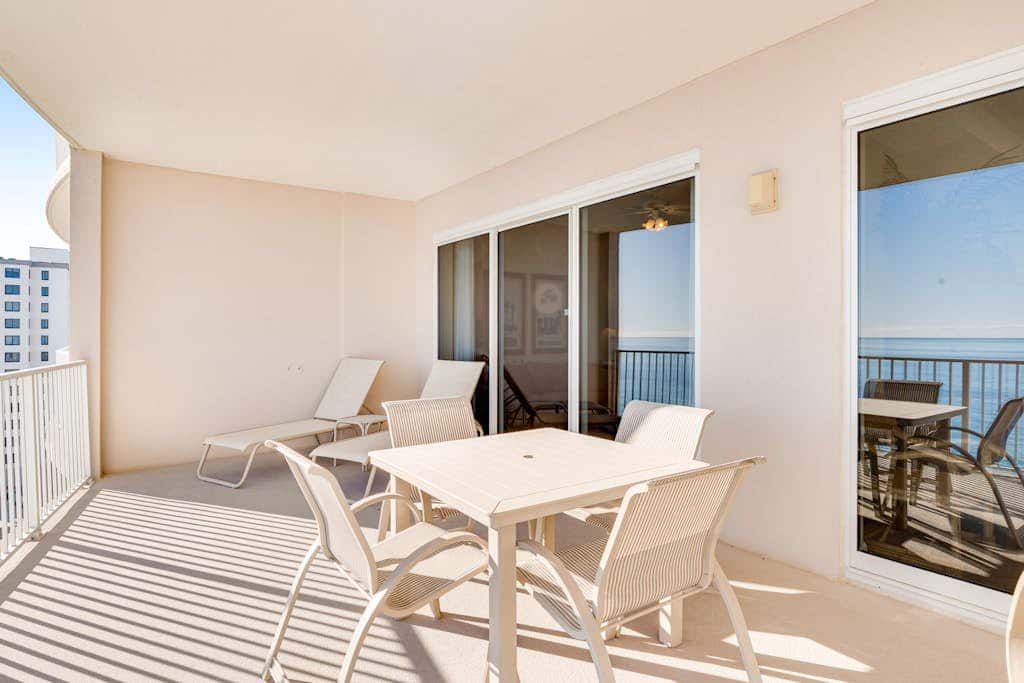 Gulf-front condo with balcony, central AC, pools, hot tubs & beach access
