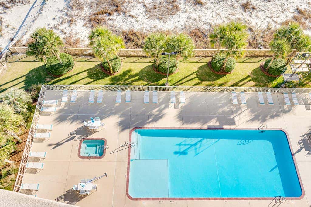 Gulf-front condo with balcony, central AC, pools, hot tubs & beach access