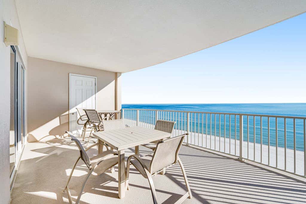 Gulf-front condo with balcony, central AC, pools, hot tubs & beach access