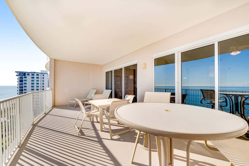Gulf-front condo with balcony, central AC, pools, hot tubs & beach access