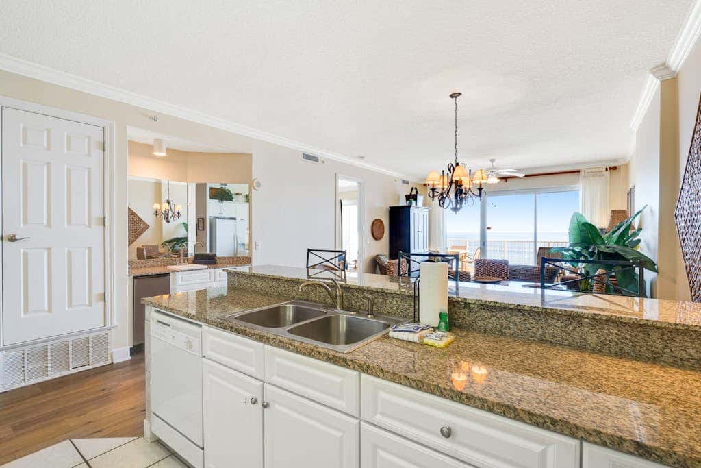 Gulf-front condo with balcony, central AC, pools, hot tubs & beach access