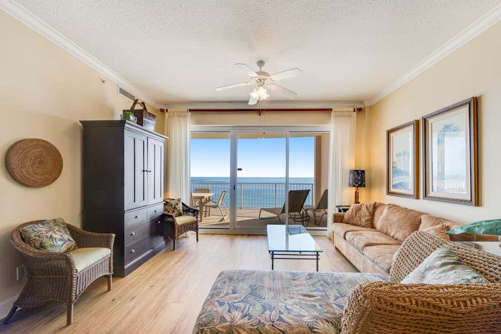 Gulf-front condo with balcony, central AC, pools, hot tubs & beach access