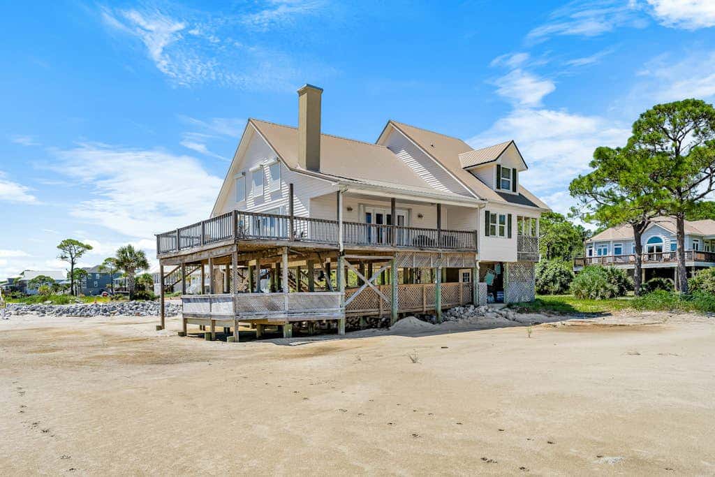Dog-friendly beach house w/ stunning water views, wrap-around decks & a loft