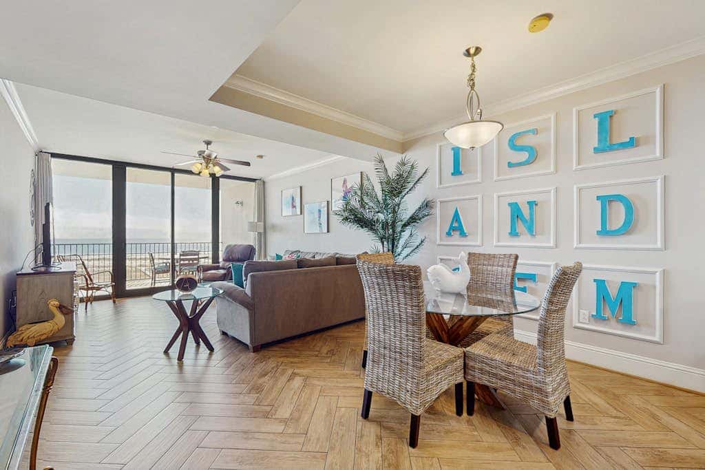 Bright & beachy waterfront condo with pools, tennis, gym, spacious balcony & W/D