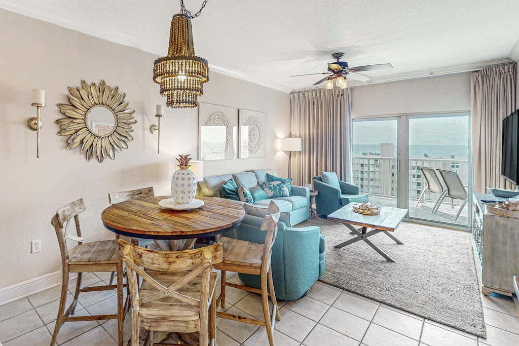 Gulf view condo with resort amenities, scenic balcony, open layout, W&D, & AC