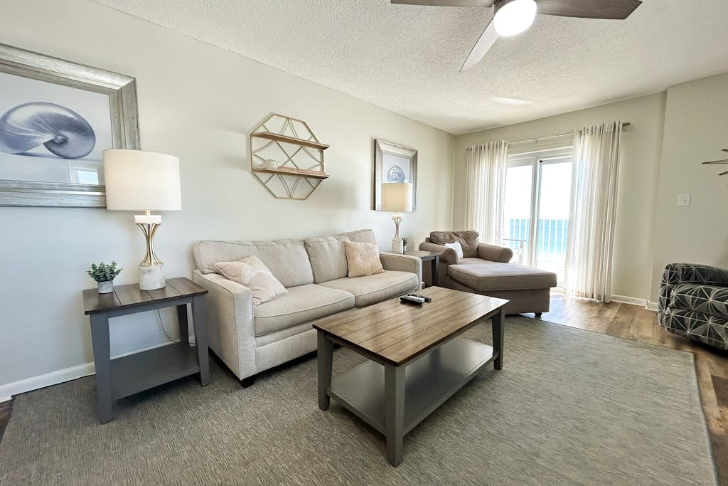 Oceanfront condo with pool, grilling area, alfresco dining, internet, W/D, & AC
