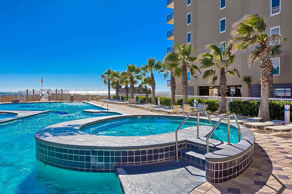 Gulf view condo on top floor with pools, hot tubs, saunas, gym & beach access