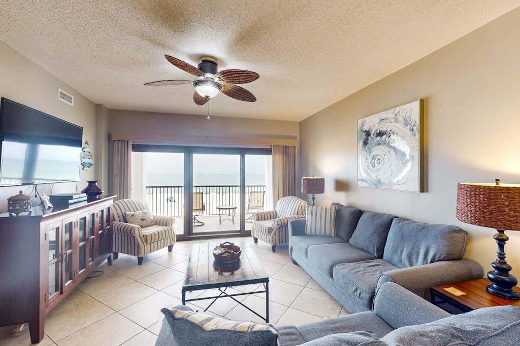 Beachfront condo with shared Gulf front outdoor pool, heated indoor pool, & sauna