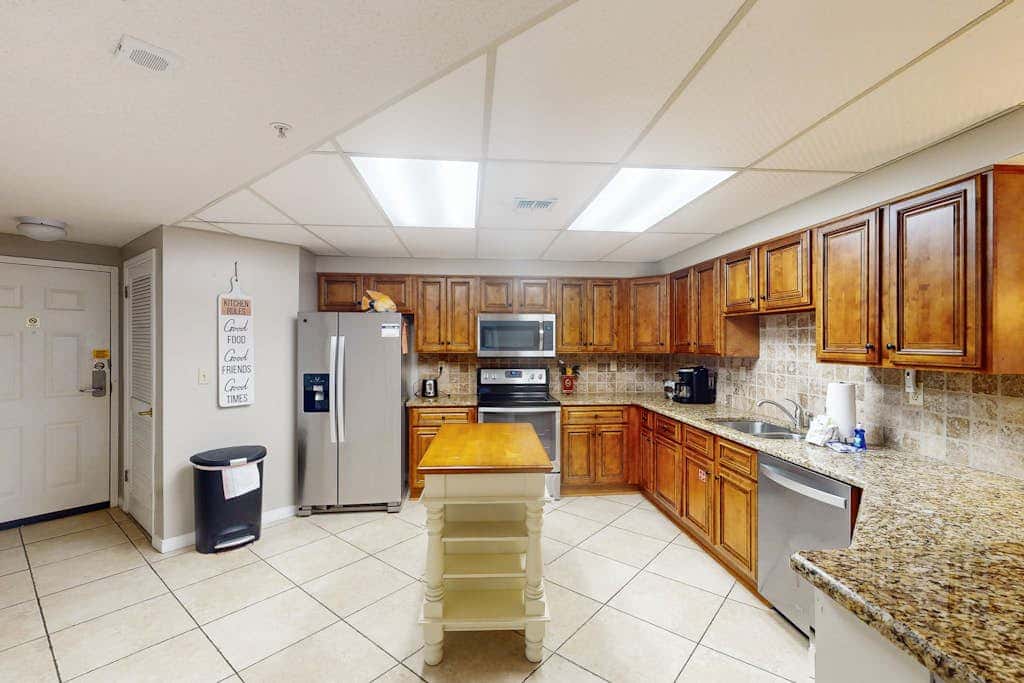 Beachfront condo with shared Gulf front outdoor pool, heated indoor pool, & sauna