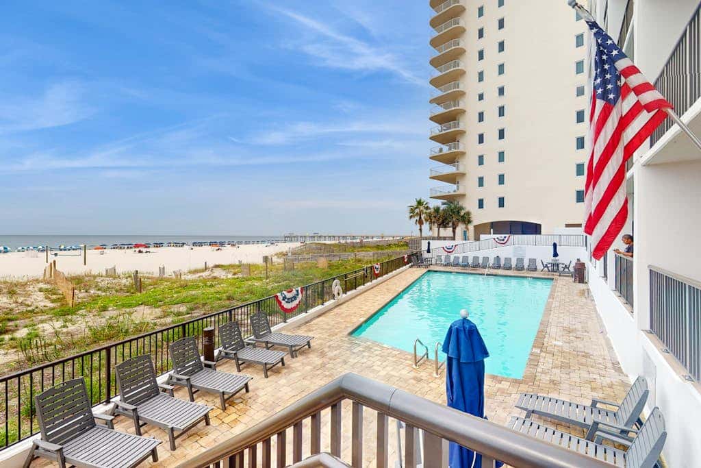 Beachfront condo with shared Gulf front outdoor pool, heated indoor pool, & sauna