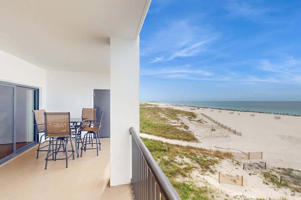 Beachfront condo with shared Gulf front outdoor pool, heated indoor pool, & sauna