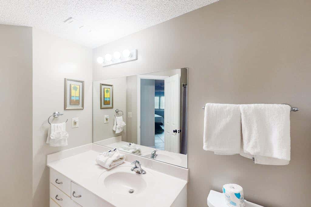 Beachfront condo with shared Gulf front outdoor pool, heated indoor pool, & sauna