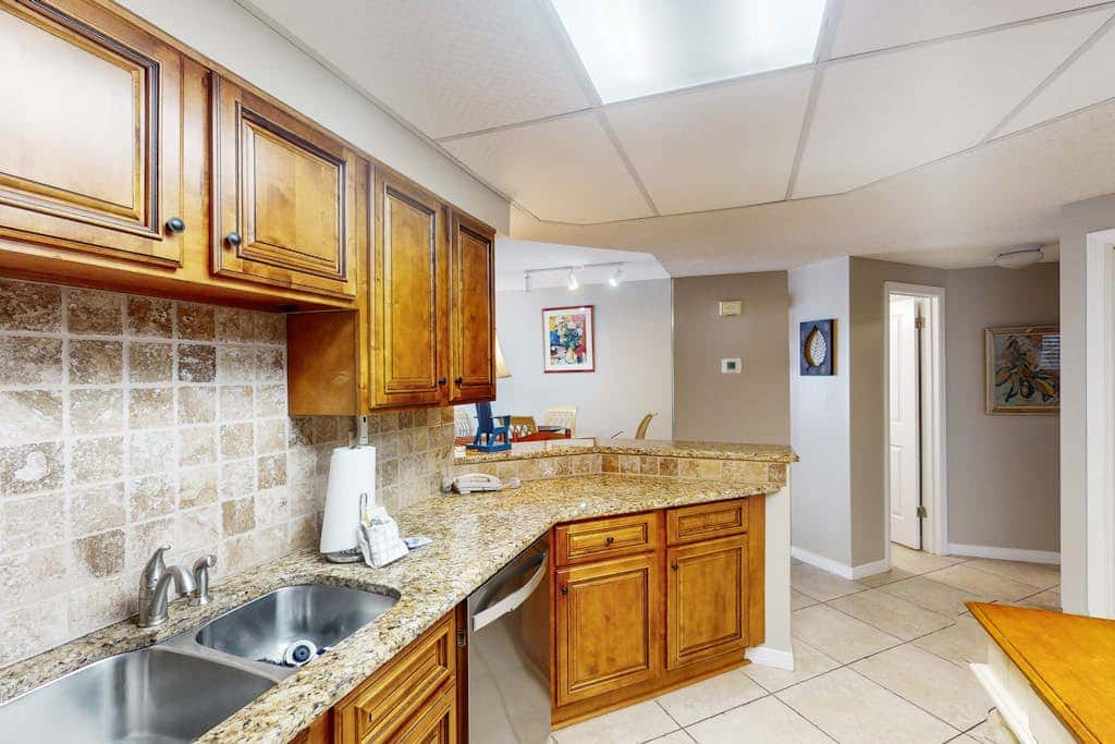 Beachfront condo with shared Gulf front outdoor pool, heated indoor pool, & sauna