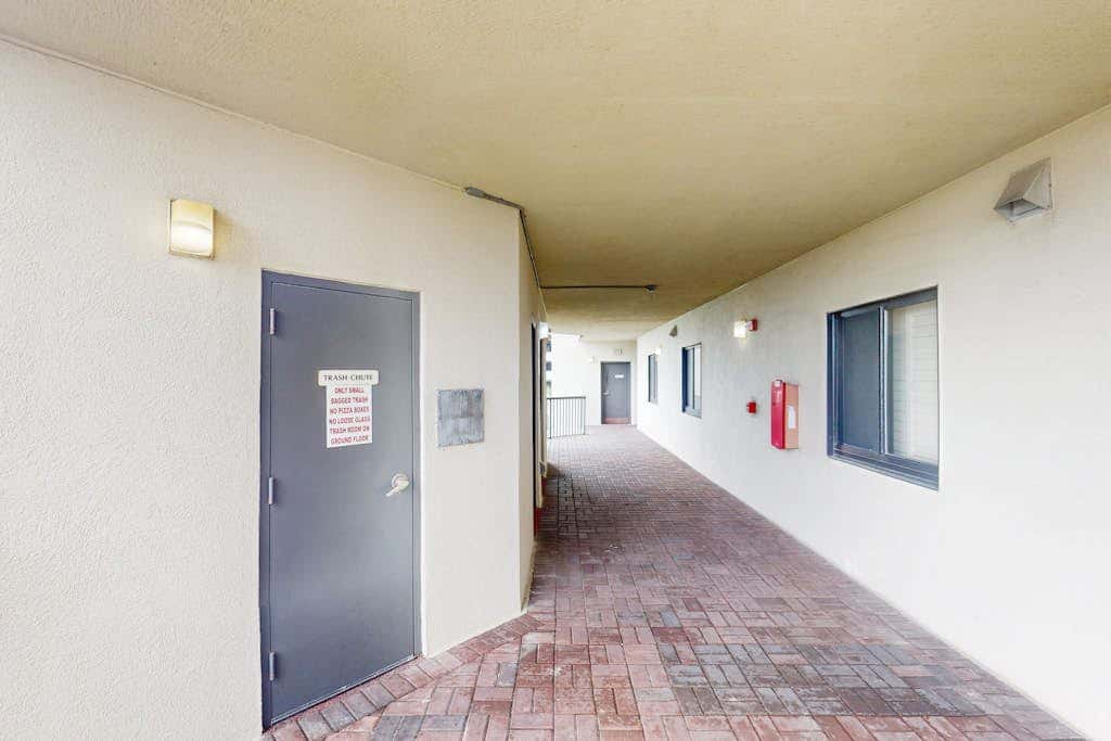 Beachfront condo with shared Gulf front outdoor pool, heated indoor pool, & sauna