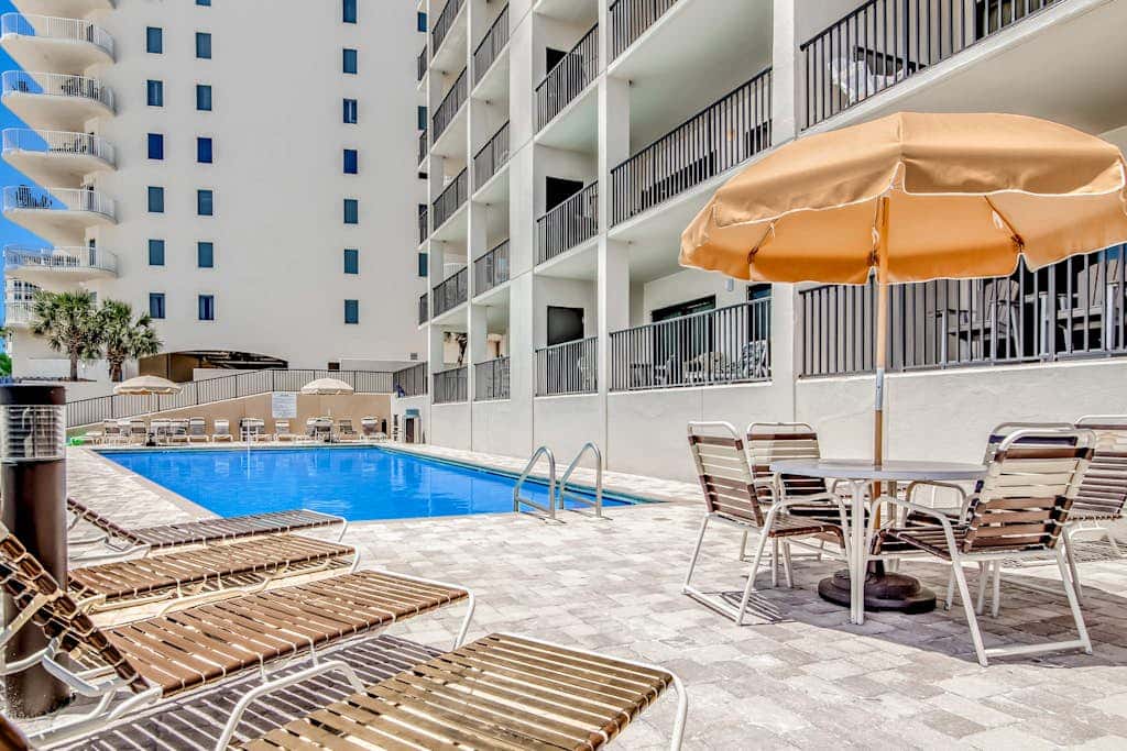 Beachfront condo with shared Gulf front outdoor pool, heated indoor pool, & sauna