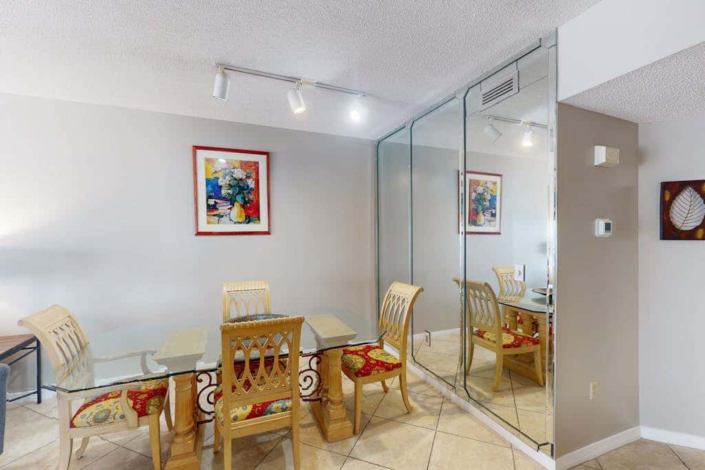 Beachfront condo with shared Gulf front outdoor pool, heated indoor pool, & sauna