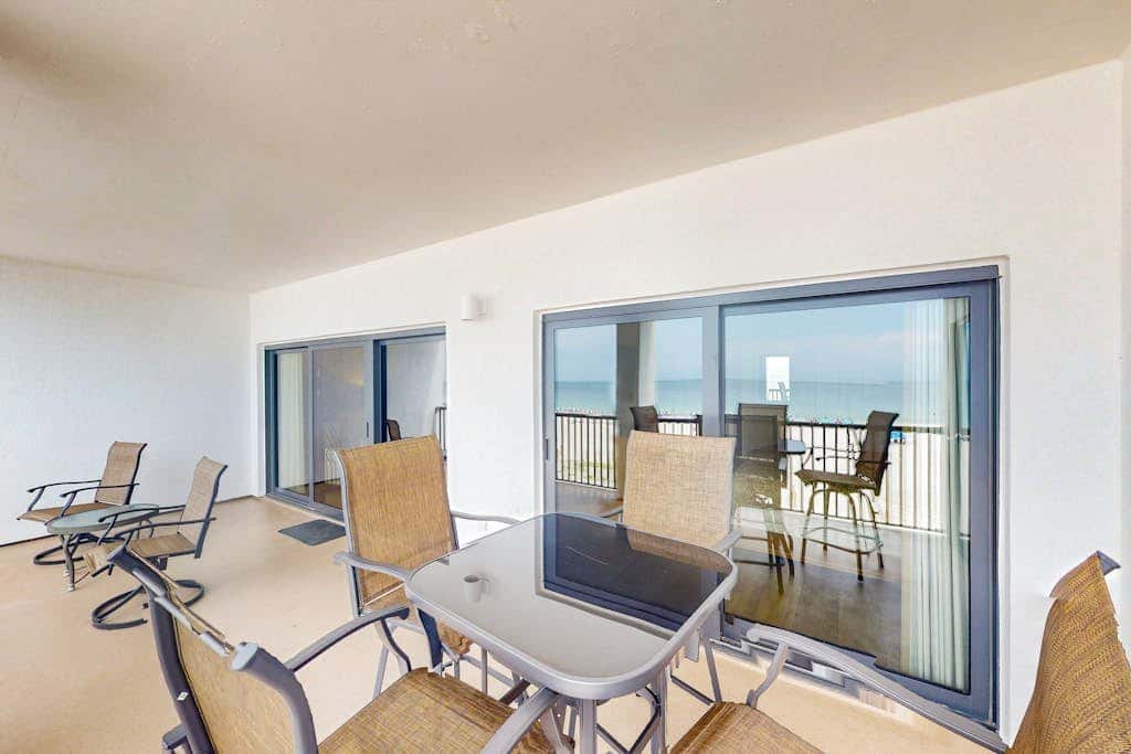 Beachfront condo with shared Gulf front outdoor pool, heated indoor pool, & sauna