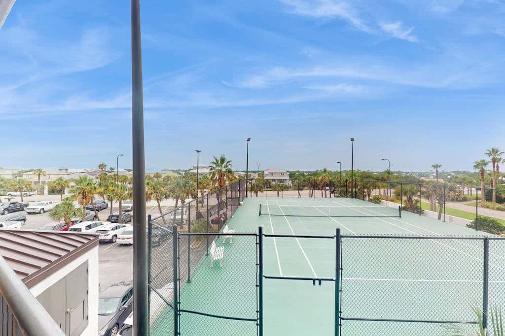 Beachfront condo with shared Gulf front outdoor pool, heated indoor pool, & sauna