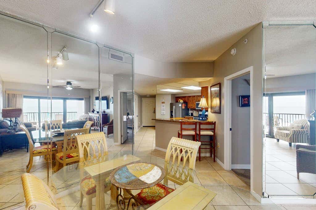 Beachfront condo with shared Gulf front outdoor pool, heated indoor pool, & sauna