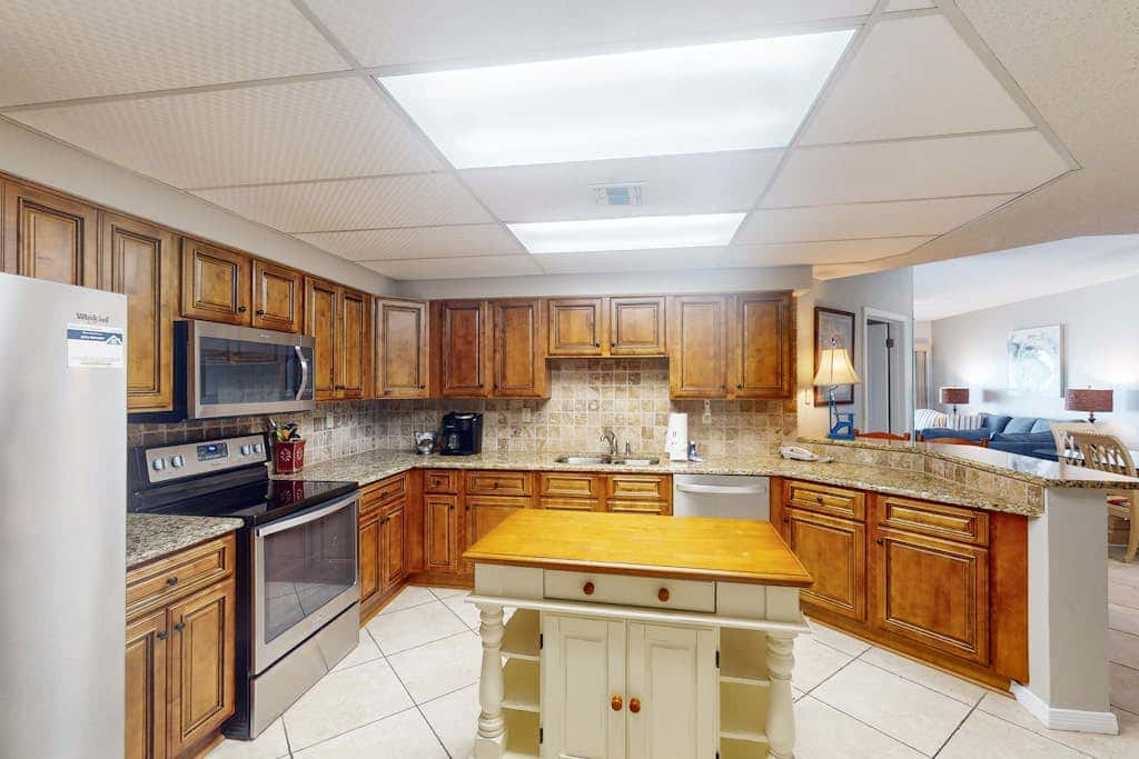 Beachfront condo with shared Gulf front outdoor pool, heated indoor pool, & sauna