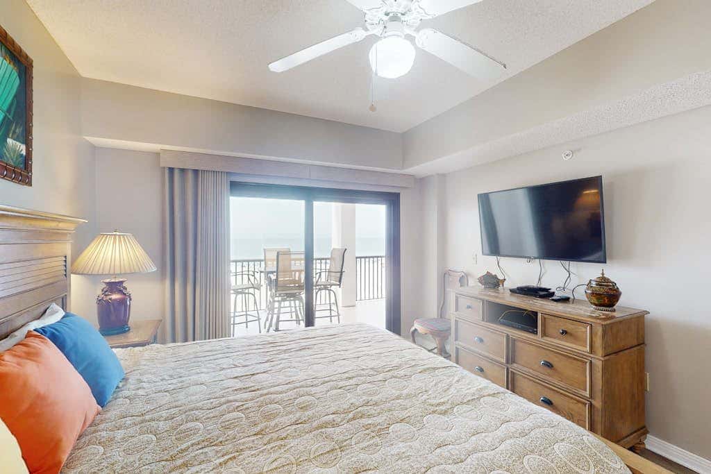 Beachfront condo with shared Gulf front outdoor pool, heated indoor pool, & sauna