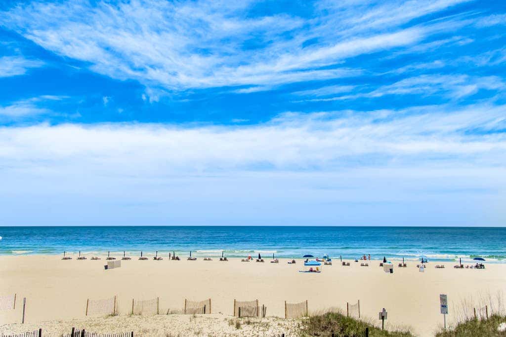 Beachfront condo with shared Gulf front outdoor pool, heated indoor pool, & sauna