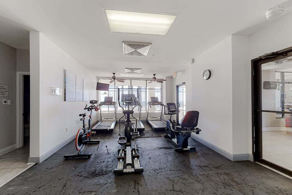 Spacious condo with Gulf-front views & access to pools, hot tub, gym