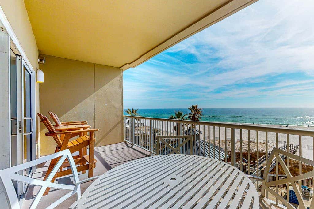 Spacious condo with Gulf-front views & access to pools, hot tub, gym