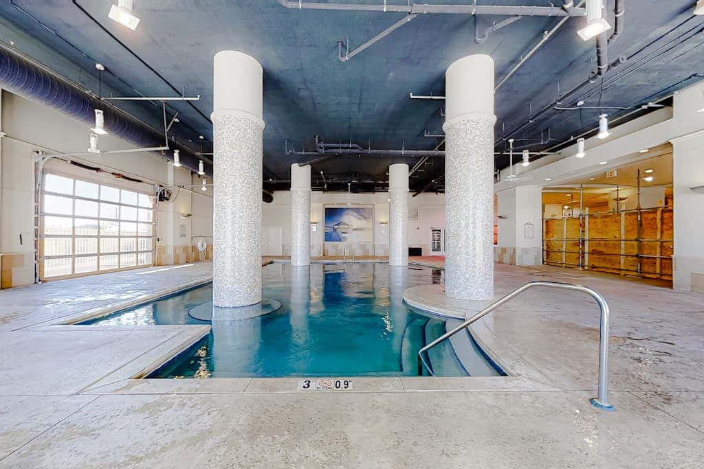 Spacious condo with Gulf-front views & access to pools, hot tub, gym