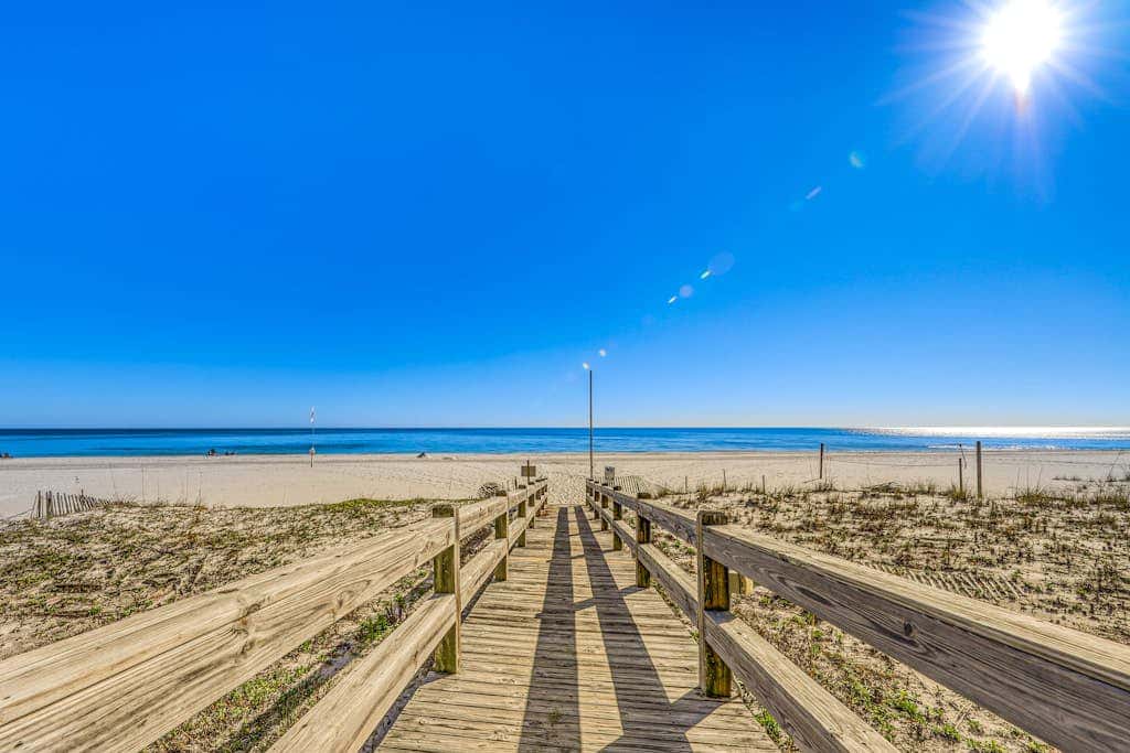 Spacious condo with Gulf-front views & access to pools, hot tub, gym