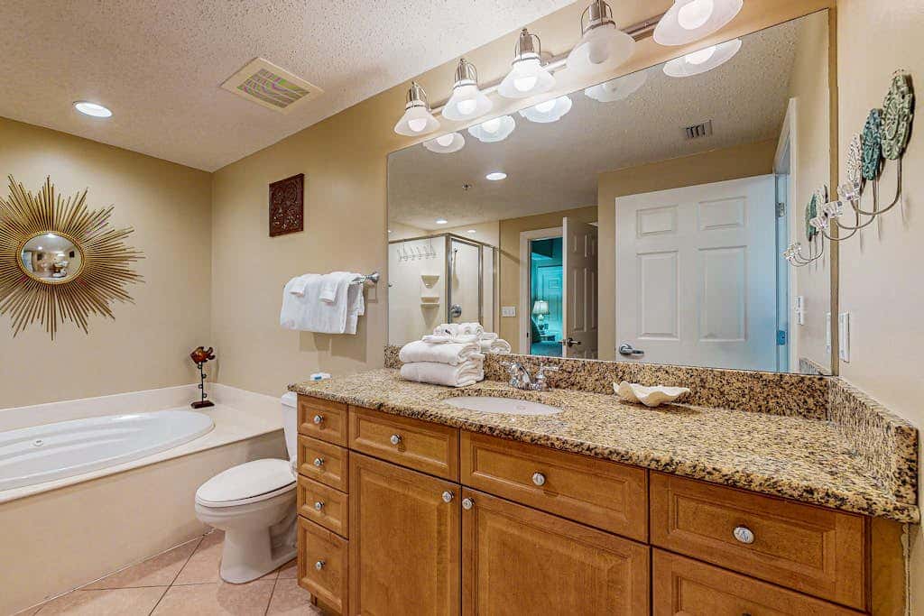 Spacious condo with Gulf-front views & access to pools, hot tub, gym