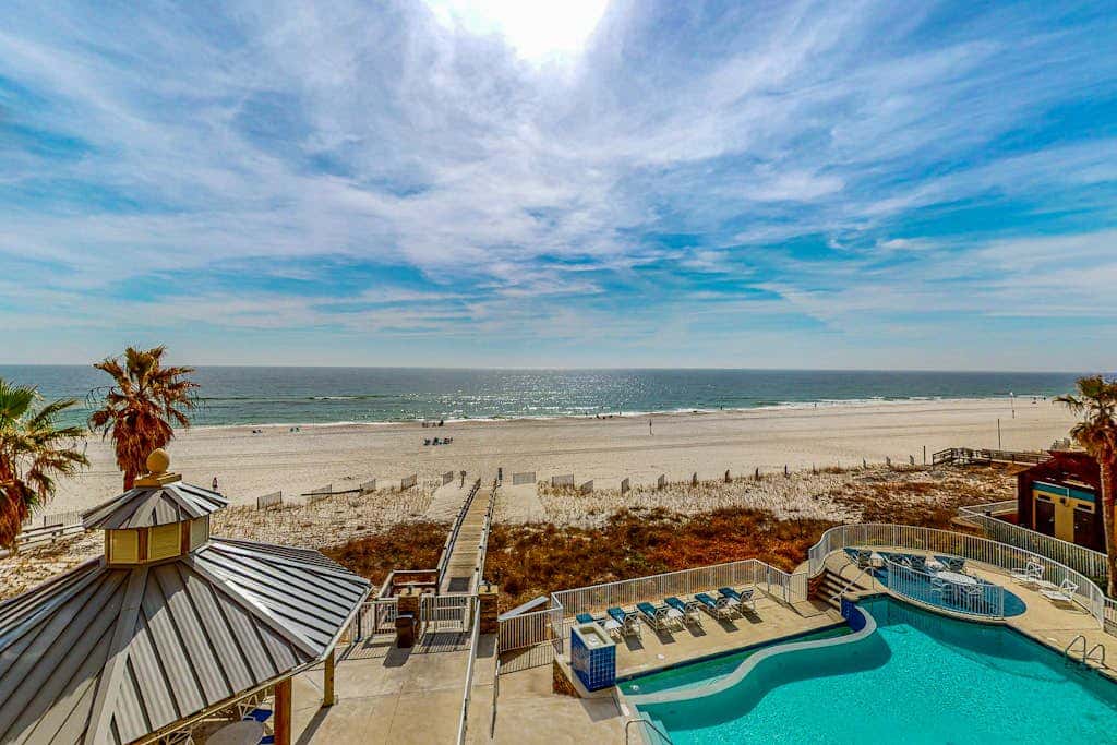 Spacious condo with Gulf-front views & access to pools, hot tub, gym