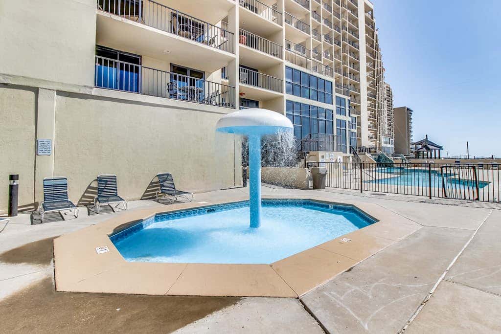 Casual beachfront getaway with pool, ocean views, & beach access