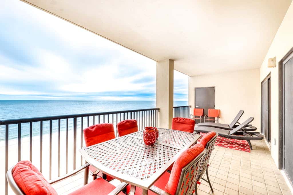 Beachfront condo with shared outdoor pool, heated indoor pool, sauna, & grill area