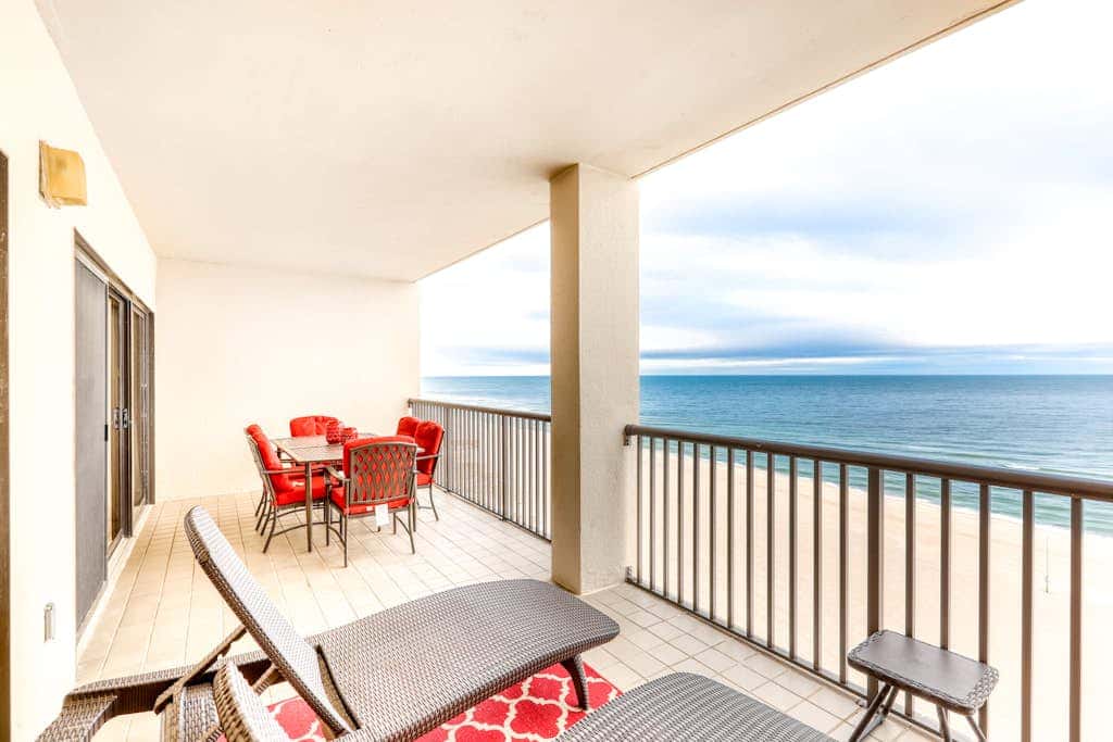 Beachfront condo with shared outdoor pool, heated indoor pool, sauna, & grill area