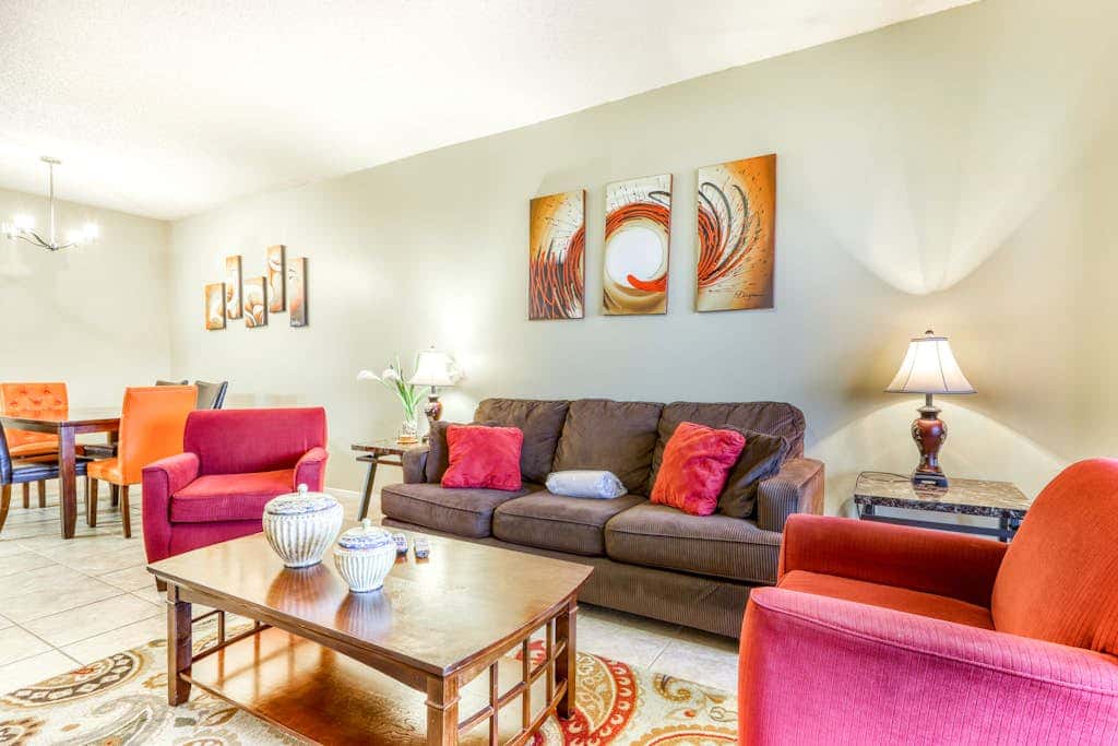 Beachfront condo with shared outdoor pool, heated indoor pool, sauna, & grill area