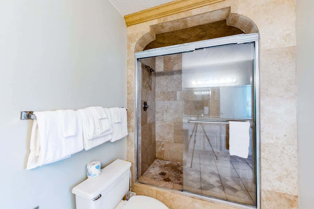 Gulf front condo with pools, hot tub - ocean view, covered balcony & washer, dryer