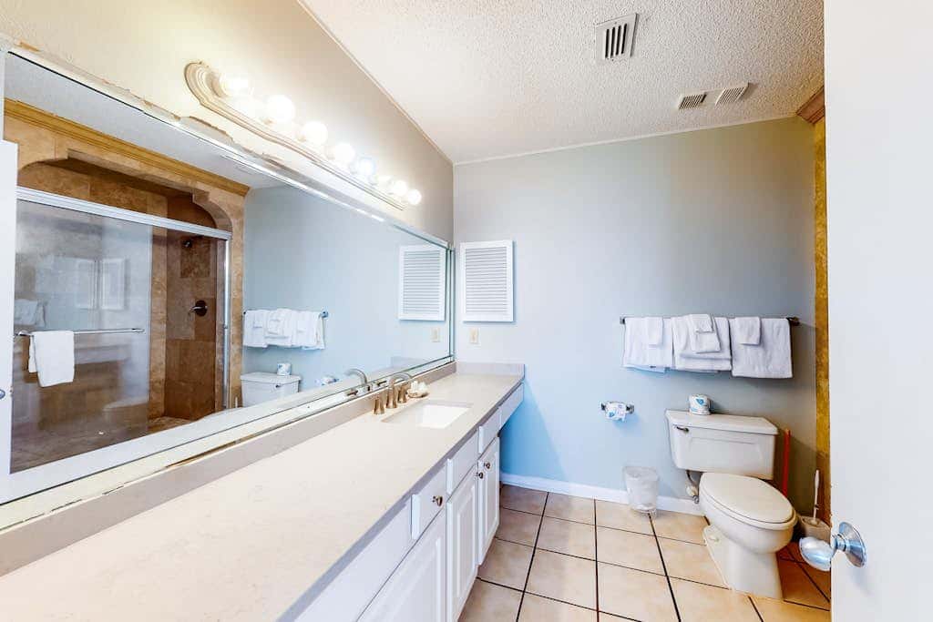 Gulf front condo with pools, hot tub - ocean view, covered balcony & washer, dryer