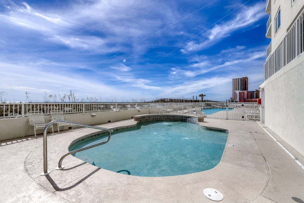 Gulf front condo with pools, hot tub - ocean view, covered balcony & washer, dryer