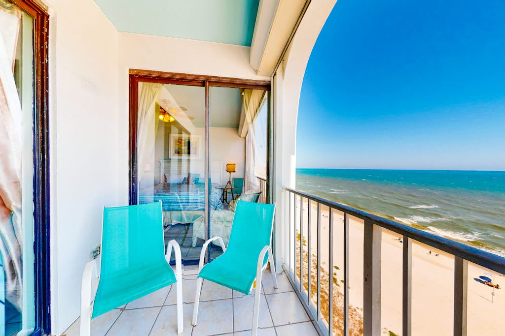 Gulf front condo with pools, hot tub - ocean view, covered balcony & washer, dryer