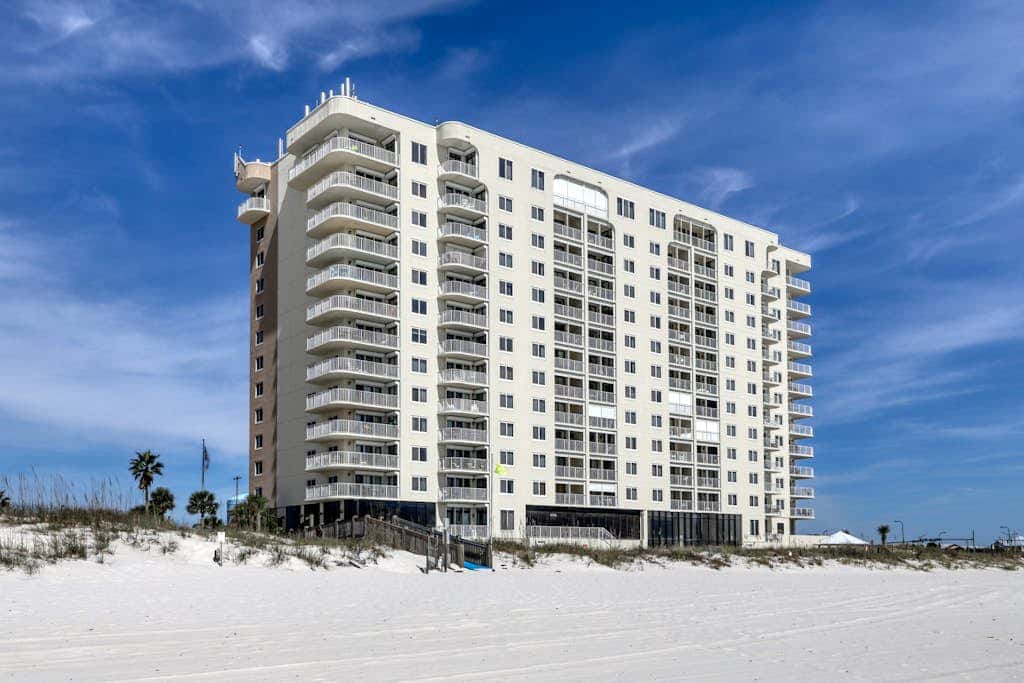 Gulf front condo with pools, hot tub - ocean view, covered balcony & washer, dryer