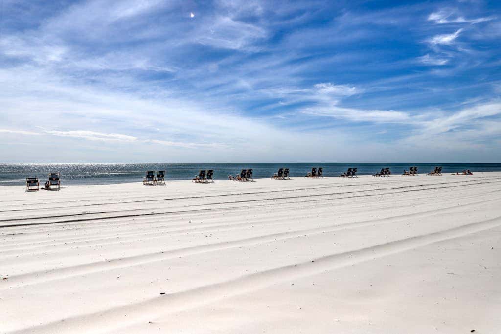 Gulf front condo with pools, hot tub - ocean view, covered balcony & washer, dryer