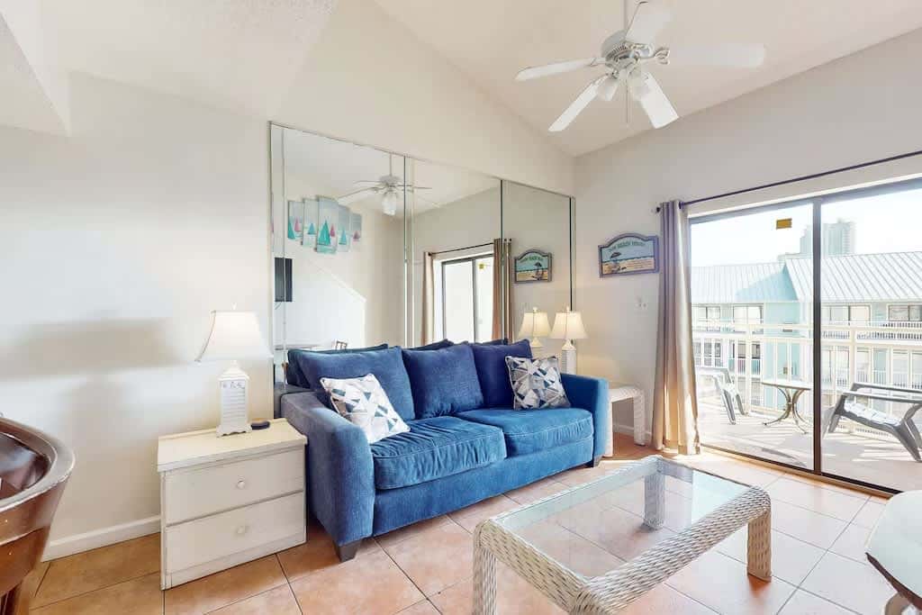 Gulf view condo with a full kitchen, private balcony, shared pools, & tennis court