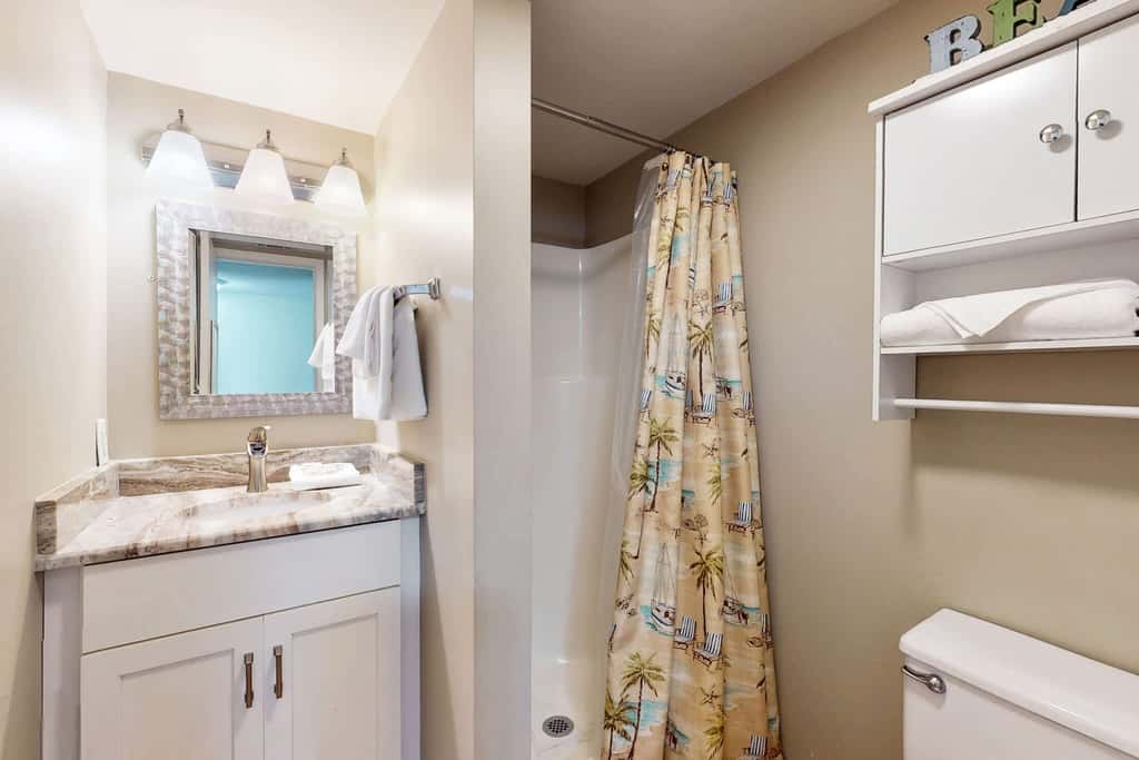 Gulf view condo with a full kitchen, private balcony, shared pools, & tennis court