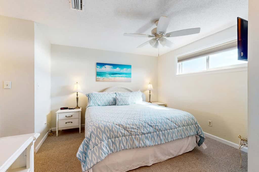 Gulf view condo with a full kitchen, private balcony, shared pools, & tennis court