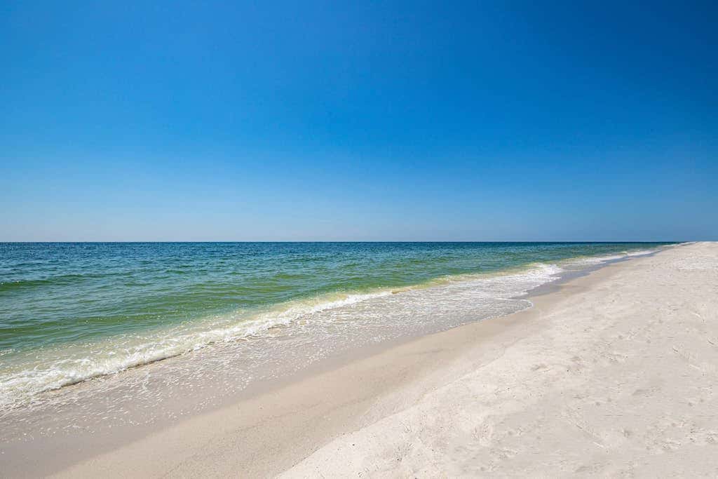 Second floor condo with free WiFi, Gulf views, central AC, and gated entrance