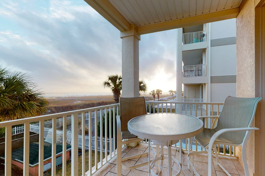 Newly renovated waterfront condo with pool, WiFi, W/D, & central AC