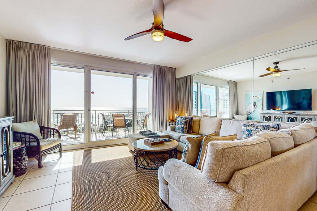 7th floor condo with ocean views, shared pool, central AC, and washer&dryer